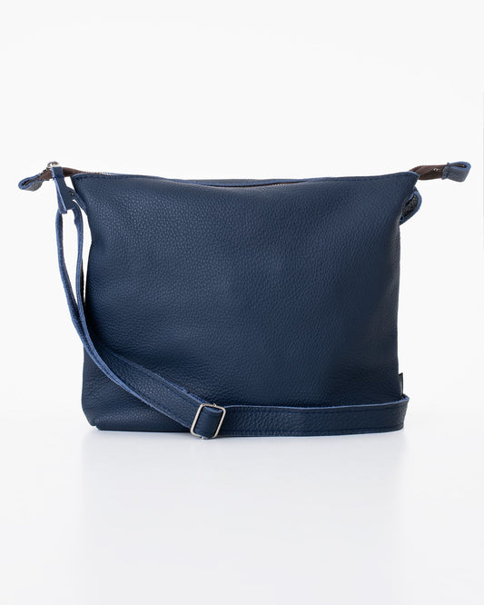 Käsintehty Trendbag-tuotemerkin Anet L nahkalaukku, joka on valmistettu laadukkaasta huonekaluteollisuuden ylijäämästä. Aitoa nahkaa, väri on tumman sininen.